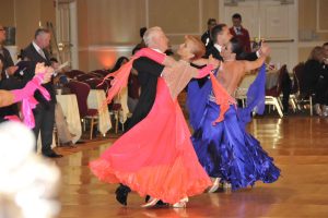 dance couples competing in ballroom dance competition